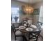 Charming dining area with elegant lighting, providing a perfect space for meals at 2600 E Allred Ave # R-88, Mesa, AZ 85204