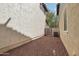 View of a minimal backyard area with rock covering and a privacy fence at 2947 N Evergreen St, Buckeye, AZ 85396