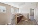 Upstairs loft features a convenient built-in desk area and neutral decor at 2947 N Evergreen St, Buckeye, AZ 85396