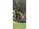 Cozy apartment building exterior with landscaped walkway and staircase, offering a serene and inviting entrance at 3131 W Cochise Dr # 256, Phoenix, AZ 85051