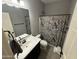 This bathroom features a shower and a vanity at 330 W Evergreen Pear Ave, Queen Creek, AZ 85140