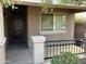 Inviting covered front porch with decorative columns and a view of the front yard at 330 W Evergreen Pear Ave, Queen Creek, AZ 85140