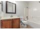 Bathroom featuring a vanity with sink, mirror, and a shower-tub combination at 33207 N Slate Creek Dr, San Tan Valley, AZ 85143