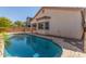 Beautiful pool and backyard, offering a private oasis for relaxation and entertaining at 33207 N Slate Creek Dr, San Tan Valley, AZ 85143