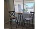 Cozy dining area featuring stylish bar-height table and seating, perfect for casual meals at 3810 W Yucca St, Phoenix, AZ 85029