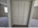 Hallway featuring built-in cabinets, providing ample storage solutions throughout the home at 3810 W Yucca St, Phoenix, AZ 85029