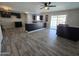 Well-lit, spacious kitchen featuring dark cabinetry, light granite countertops, with tile floor at 3810 W Yucca St, Phoenix, AZ 85029
