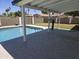 Covered patio overlooking the backyard pool, providing a relaxing outdoor living space at 3810 W Yucca St, Phoenix, AZ 85029