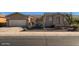 Charming single-story home with desert landscaping and a two-car garage at 42625 W Sandpiper Dr, Maricopa, AZ 85138