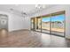 Spacious room features hardwood floors, recessed lighting, and a sliding glass door to the back yard at 4314 E Bernice St, Gilbert, AZ 85295