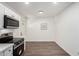 Open floor plan kitchen with modern appliances and attached dining area at 48 S Catalina St, Gilbert, AZ 85233