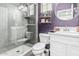 Modern bathroom featuring a glass-enclosed shower, sleek vanity, and stylish decor with a round mirror at 5051 S Moccasin Trl, Gilbert, AZ 85298