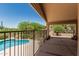 Inviting backyard with a sparkling pool and serene views of the desert landscape at 6010 E Languid Ln, Carefree, AZ 85377