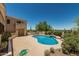 Beautiful backyard featuring a private pool, complemented by mature desert landscaping at 6010 E Languid Ln, Carefree, AZ 85377