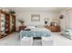 Cozy bedroom with a comfortable bed, wooden dresser, and bright natural light at 6010 E Languid Ln, Carefree, AZ 85377