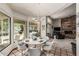 Inviting dining area with natural light, seamlessly connected to the living space and backyard views at 6010 E Languid Ln, Carefree, AZ 85377