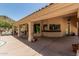Expansive covered patio with outdoor bar, ideal for enjoying desert living and entertaining guests at 6010 E Languid Ln, Carefree, AZ 85377