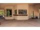 Large, covered patio with an outdoor bar, perfect for entertaining guests year-round at 6010 E Languid Ln, Carefree, AZ 85377