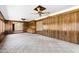 Spacious room with wood paneled walls and wet bar, and great views of the landscaped backyard at 631 Leisure World --, Mesa, AZ 85206
