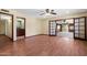 Spacious living room featuring hardwood floors and open doorways that offer plenty of natural light at 631 Leisure World --, Mesa, AZ 85206