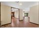 Open-concept living area with hardwood floors and seamless flow to kitchen and other living spaces at 631 Leisure World --, Mesa, AZ 85206