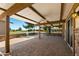 Covered patio with stone columns offering beautiful view of golf course at 631 Leisure World --, Mesa, AZ 85206