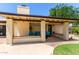 Covered patio with brick pillars, comfortable seating, and nice shade at 6417 E Kings Ave, Scottsdale, AZ 85254