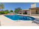 Inviting outdoor pool area with lounge seating and a patio, perfect for relaxation and entertainment at 6417 E Kings Ave, Scottsdale, AZ 85254