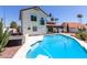 Backyard pool and spa with patio area for lounging and entertaining at 7108 W Morrow Dr, Glendale, AZ 85308