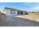 Backyard of single story house with covered patio and block wall fence at 8027 W Northview Ave, Glendale, AZ 85303