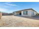 Backyard of single story home with covered patio at 8027 W Northview Ave, Glendale, AZ 85303
