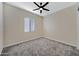 Bedroom with neutral tones and carpeted floors at 8027 W Northview Ave, Glendale, AZ 85303