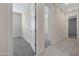 Hallway that provides access to the bedrooms and common areas of the home at 8027 W Northview Ave, Glendale, AZ 85303