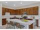 Beautiful kitchen island with stainless steel appliances and lots of counter space at 8027 W Northview Ave, Glendale, AZ 85303