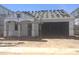 Exterior view of home under construction, showcasing the roof tiles and frame at 805 W Lark Dr # 243, Queen Creek, AZ 85140