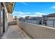 Spacious balcony with stucco railing and stunning views of the community at 8619 N 67Th Dr, Peoria, AZ 85345