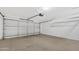 Spacious garage with ample parking and additional storage area at 8619 N 67Th Dr, Peoria, AZ 85345