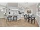 Modern kitchen with stainless appliances, breakfast bar, and skylight offers a bright and inviting space at 8619 N 67Th Dr, Peoria, AZ 85345