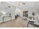 Spacious living area with laminate floors, ceiling fan and sliding door to patio, perfect for entertaining at 8619 N 67Th Dr, Peoria, AZ 85345