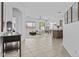 Open-concept living area with modern decor, tile, and carpet flooring at 8753 E Plata Ave, Mesa, AZ 85212