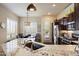 Bright kitchen featuring granite countertops, stainless steel appliances, and a breakfast nook at 8820 E Ivy Cir, Mesa, AZ 85207