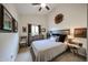 Cozy bedroom with decor, lighting and closet at 9085 E Windrose Dr, Scottsdale, AZ 85260