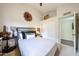 Cozy bedroom with a closet and high ceilings at 9085 E Windrose Dr, Scottsdale, AZ 85260