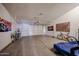 Spacious two car garage featuring high ceilings, bright lighting, and ample storage space at 9085 E Windrose Dr, Scottsdale, AZ 85260