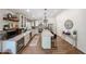Expansive kitchen with modern appliances, a large island, and ample counter space at 9085 E Windrose Dr, Scottsdale, AZ 85260