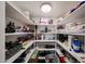 Walk-in pantry with lots of shelving at 9085 E Windrose Dr, Scottsdale, AZ 85260