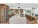 Open kitchen with large island, stainless steel appliances, and view to the living room at 9450 N 83Rd Pl, Scottsdale, AZ 85258