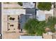 A bird's-eye view reveals a well-maintained home with low-maintenance landscaping and updated roofing at 9520 N Central Ave, Phoenix, AZ 85020