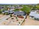 An aerial view of a charming home features lush landscaping and surrounding neighborhood amenities at 9520 N Central Ave, Phoenix, AZ 85020