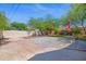 Large backyard with a seating area and stone pavement offers a great space for outdoor lounging at 9520 N Central Ave, Phoenix, AZ 85020